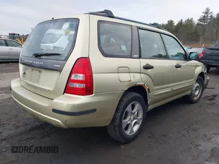 2003 Subaru Forester XS with VIN JF1SG65683H734188, listed as a IAAI auction lot 41584619 with 242,536 mi miles. Bid and sale history available at carsss.com. Image 4.