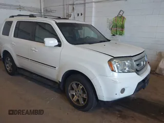 2010 Honda Pilot Touring with VIN 5FNYF4H95AB019903, listed as a IAAI auction lot 42196082 with 233,527 mi miles and . Bid and sale history available at carsss.com. Image 1.