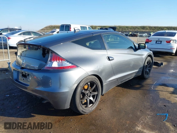 2015 Honda CR-Z EX with VIN JHMZF1C62FS002209, listed as a IAAI auction lot 41291326 with 73,301 mi miles and . Bid and sale history available at DreamBid. Image 4.