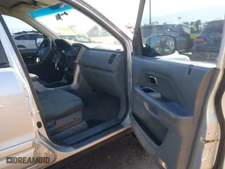 2006 Honda Pilot LX with VIN 2HKYF18156H556689, listed as a IAAI auction lot 40792236 with 273,856 mi miles. Bid and sale history available at carsss.com. Image 5.