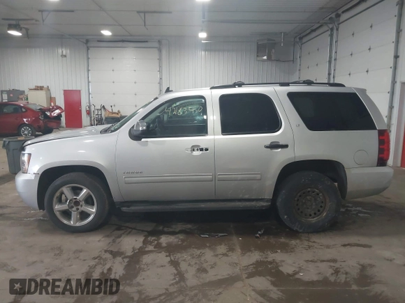 2012 Chevrolet Tahoe LT z VIN 1GNSCBE01CR326465, wystawiony jako IAAI lot #42183450 z przebiegiem 220 129 mil mil oraz . Historia ofert i sprzedaży dostępna na DreamBid. Obrazek 14.