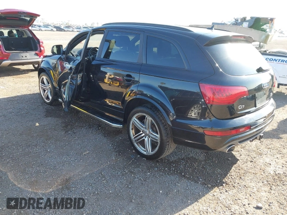 2015 Audi Q7 3.0L TDI Prestige with VIN WA1WMAFE2FD022262, listed as a IAAI auction lot 41969144 with 271,507 mi miles. Bid and sale history available at carsss.com. Image 3.