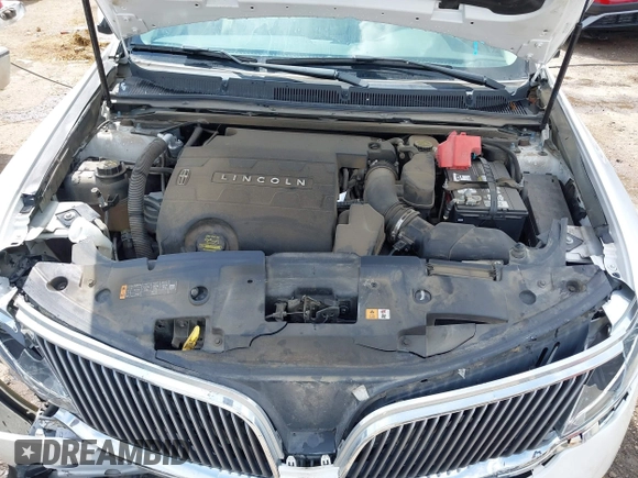 2014 Lincoln MKS z VIN 1LNHL9DK7EG601720, wystawiony jako IAAI lot #42464979 z przebiegiem 58 163 mil mil oraz . Historia ofert i sprzedaży dostępna na DreamBid. Obrazek 10.