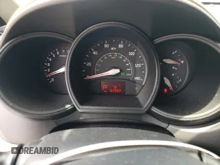 2014 Kia Rio EX z VIN KNADN4A3XE6377570, wystawiony jako Copart lot #54705705 z przebiegiem 63 982 mil mil oraz Tytuł czysty. Historia ofert i sprzedaży dostępna na DreamBid. Obrazek 9.