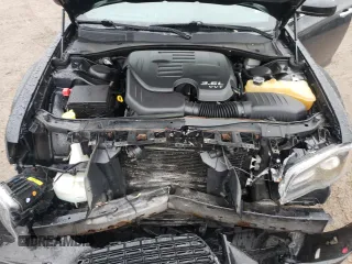 2012 Chrysler 300 S z VIN 2C3CCABG0CH306995, wystawiony jako Copart lot #58811675 z przebiegiem 127 498 mil mil oraz Szkoda całkowita • Salvage title. Historia ofert i sprzedaży dostępna na DreamBid. Obrazek 11.