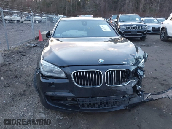 2015 BMW 7 Series 740Li xDrive with VIN WBAYF4C51FGS99074, listed as a IAAI auction lot 41222498 with 132,789 mi miles. Bid and sale history available at carsss.com. Image 12.