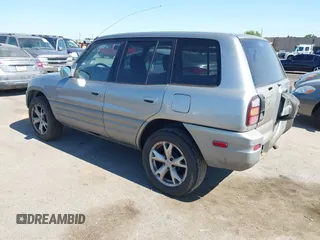 1999 Toyota RAV4 with VIN JT3GP10V4X7055360, listed as a IAAI auction lot 42718612 with 238,904 mi miles and . Bid and sale history available at DreamBid. Image 3.