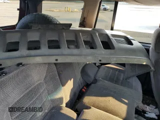1996 Jeep Grand Cherokee z VIN 1J4EZ58Y5TC142263, wystawiony jako Copart lot #70532894 z przebiegiem Nie podano mil oraz Szkoda całkowita • Salvage title. Historia ofert i sprzedaży dostępna na DreamBid. Obrazek 12.