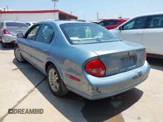 2001 Nissan Maxima GXE with VIN JN1CA31D51T604935, listed as a IAAI auction lot 42504918 with 253,407 mi miles and . Bid and sale history available at DreamBid. Image 3.