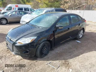 2013 Ford Focus SE z VIN 1FADP3F28DL312357, wystawiony jako IAAI lot #41798311 z przebiegiem 98 280 mil mil oraz . Historia ofert i sprzedaży dostępna na DreamBid. Obrazek 17.