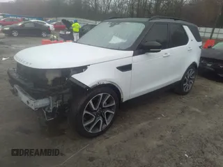 2018 Land Rover Discovery HSE Luxury z VIN SALRT2RV3JA057709, wystawiony jako IAAI lot #41563821 z przebiegiem 99 639 mil mil oraz . Historia ofert i sprzedaży dostępna na DreamBid. Obrazek 2.