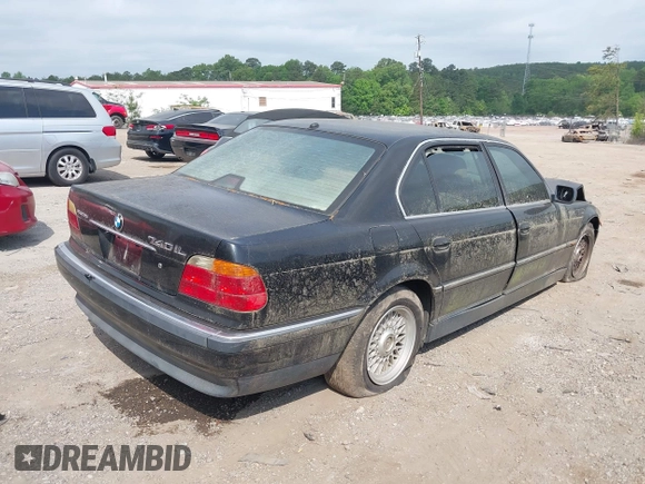 1999 BMW 7 Series 740il with VIN WBAGH8334XDP01166, listed as a IAAI auction lot 42073939 with 1 mi miles. Bid and sale history available at carsss.com. Image 4.