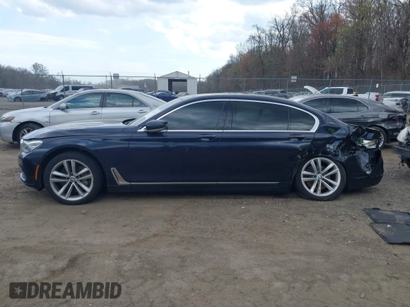 2016 BMW 7 Series 750i xDrive with VIN WBA7F2C58GG418482, listed as a IAAI auction lot 41931831 with 97,776 mi miles and . Bid and sale history available at DreamBid. Image 13.