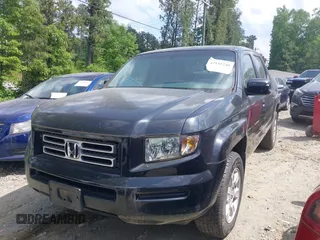 2006 Honda Ridgeline RTS with VIN 2HJYK16426H575651, listed as a IAAI auction lot 42151240 with 262,135 mi miles. Bid and sale history available at carsss.com. Image 2.