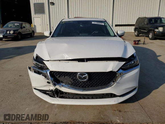 2019 Mazda 6 Grand Touring with VIN JM1GL1TY4K1507123, listed as a Copart auction lot 74100054 with 63,809 mi miles and Salvage Title. Bid and sale history available at carsss.com. Image 5.