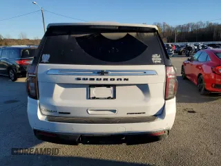 2022 Chevrolet Suburban Premier with VIN 1GNSKFKT7NR242288, listed as a Copart auction lot 79420734 with 77,006 mi miles and Salvage Title. Bid and sale history available at DreamBid. Image 6.