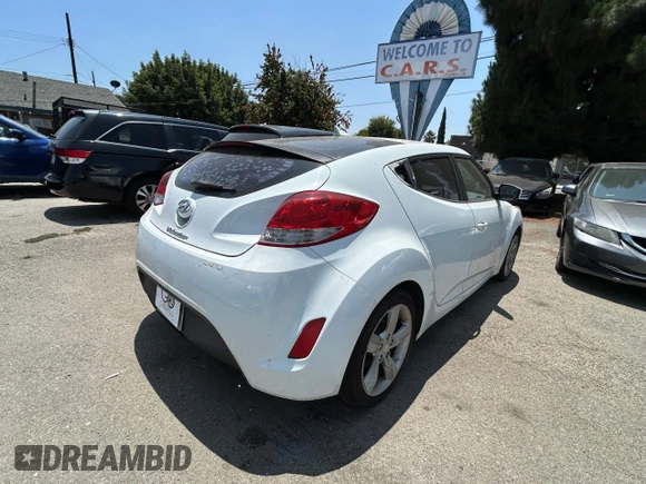 2012 Hyundai Veloster w/Black Int with VIN KMHTC6AD1CU020923, listed as a Copart auction lot 62790155 with 145,974 mi miles and Clean title. Bid and sale history available at DreamBid. Image 4.