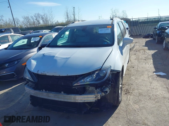 2017 Chrysler Pacifica Touring L with VIN 2C4RC1BG8HR677720, listed as a IAAI auction lot 41976606 with 170,175 mi miles and . Bid and sale history available at DreamBid. Image 13.
