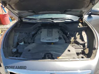 2014 Infiniti QX70 with VIN JN8CS1MU1EM451534, listed as a Copart auction lot 52677335 with 118,862 mi miles and Salvage Title. Bid and sale history available at DreamBid. Image 12.