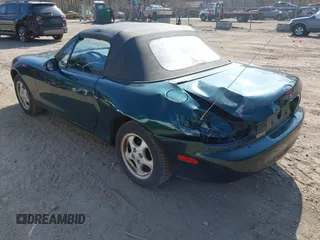 1999 Mazda MX-5 Miata with VIN JM1NB3537X0109618, listed as a IAAI auction lot 41795736 with 160,452 mi miles and . Bid and sale history available at DreamBid. Image 3.