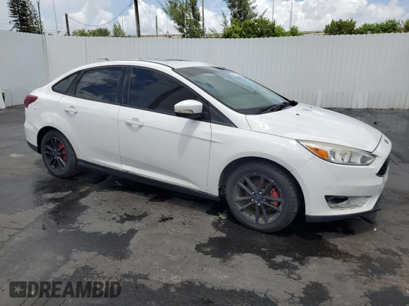 2016 Ford Focus SE with VIN 1FADP3F2XGL204472, listed as a Copart auction lot 68378244 with 152,991 mi miles and Clean title. Bid and sale history available at DreamBid. Image 4.