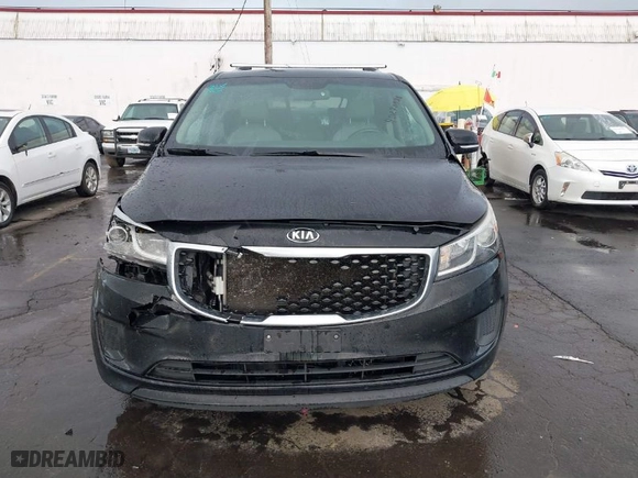 2017 Kia Sedona LX with VIN KNDMB5C10H6251946, listed as a IAAI auction lot 40870988 with NaN miles. Bid and sale history available at carsss.com. Image 12.