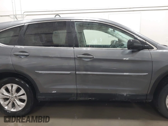 2013 Honda CR-V EX with VIN 2HKRM4H59DH682484, listed as a IAAI auction lot 41504589 with 208,260 mi miles and . Bid and sale history available at DreamBid. Image 13.