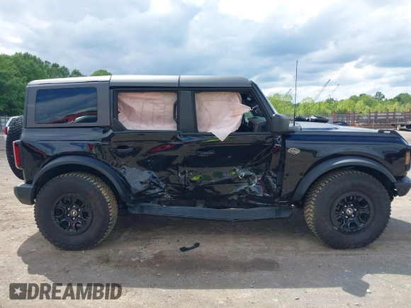 2024 Ford Bronco Wildtrak with VIN 1FMEE2BP1RLA75293, listed as a IAAI auction lot 42199529 with 6,466 mi miles and . Bid and sale history available at DreamBid. Image 13.