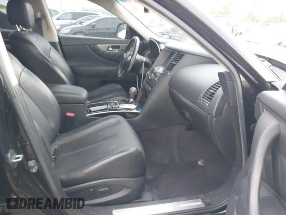 2016 Infiniti QX70 with VIN JN8CS1MU1GM130337, listed as a IAAI auction lot 42124059 with 148,876 mi miles and . Bid and sale history available at DreamBid. Image 5.