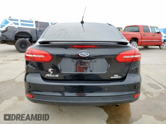 2015 Ford Focus SE z VIN 1FADP3F29FL357021, wystawiony jako Copart lot #57985125 z przebiegiem 142 786 mil mil oraz Szkoda całkowita • Salvage title. Historia ofert i sprzedaży dostępna na DreamBid. Obrazek 6.