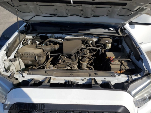 2017 Toyota Tacoma SR z VIN 5TFAX5GNXHX074690, wystawiony jako Copart lot #56672165 z przebiegiem 107 292 mil mil oraz Szkoda całkowita • Salvage title. Historia ofert i sprzedaży dostępna na DreamBid. Obrazek 11.