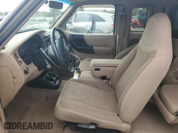 1999 Ford Ranger XLT with VIN 1FTZR15X6XPB58756, listed as a Copart auction lot 58839535 with 127,860 mi miles and Salvage title. Bid and sale history available at DreamBid. Image 7.
