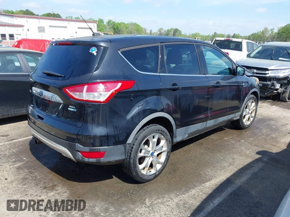 2013 Ford Escape SEL with VIN 1FMCU9H94DUA10002, listed as a IAAI auction lot 41963247 with 85,941 mi miles. Bid and sale history available at carsss.com. Image 4.