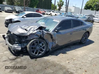 2023 Dodge Charger SXT z VIN 2C3CDXBG2PH595593, wystawiony jako Copart lot #56520425 z przebiegiem 24 217 mil mil oraz Czysty tytuł • Clean title. Historia ofert i sprzedaży dostępna na DreamBid. Obrazek 1.