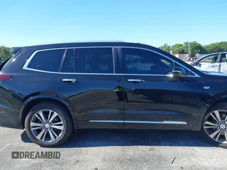 2020 Cadillac XT6 FWD Premium Luxury with VIN 1GYKPCRS7LZ211197, listed as a IAAI auction lot 42231424 with 57,351 mi miles and . Bid and sale history available at DreamBid. Image 13.