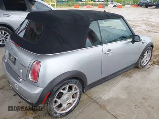 2006 MINI Convertible S with VIN WMWRH33556TL93023, listed as a IAAI auction lot 42744691 with 128,192 mi miles and . Bid and sale history available at DreamBid. Image 4.