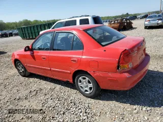 2005 Hyundai Accent GLS with VIN KMHCG45C15U592443, listed as a Copart auction lot 52291025 with 142,263 mi miles and Salvage Title. Bid and sale history available at carsss.com. Image 2.