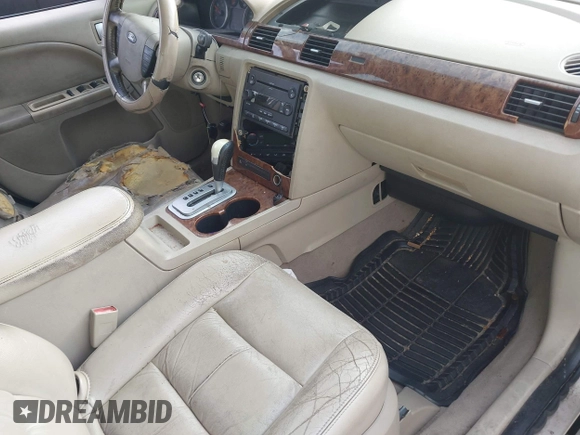 2007 Ford Five Hundred SEL z VIN 1FAHP241X7G130257, wystawiony jako IAAI lot #42129777 z przebiegiem 266 107 mil mil oraz . Historia ofert i sprzedaży dostępna na DreamBid. Obrazek 5.