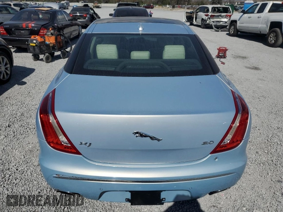 2014 Jaguar XJ with VIN SAJWA1CZ4E8V71167, listed as a Copart auction lot 43994545 with 69,682 mi miles and Salvage Title. Bid and sale history available at DreamBid. Image 6.