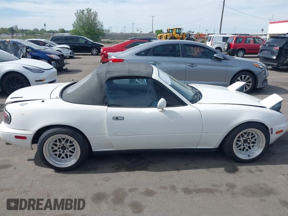 1992 Mazda MX-5 Miata with VIN JM1NA3513N0308521, listed as a IAAI auction lot 42225665 with 235,947 mi miles and . Bid and sale history available at DreamBid. Image 13.