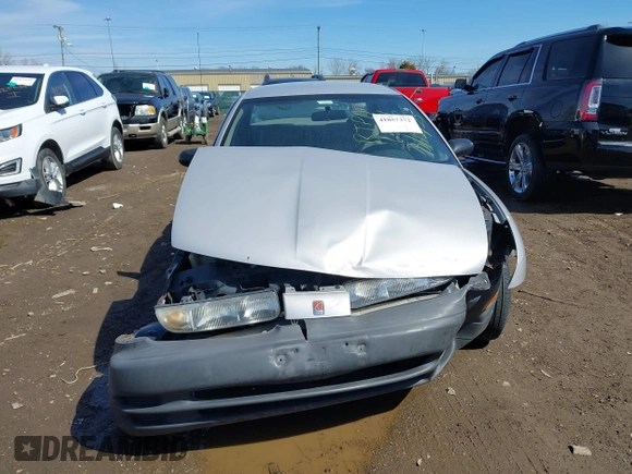 1999 Saturn SL z VIN 1G8ZH5281XZ376254, wystawiony jako IAAI lot #41857372 z przebiegiem 229 836 mil mil oraz . Historia ofert i sprzedaży dostępna na DreamBid. Obrazek 12.
