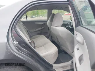 2009 Toyota Corolla with VIN JTDBL40E999048446, listed as a IAAI auction lot 42210822 with 260,005 mi miles. Bid and sale history available at carsss.com. Image 8.