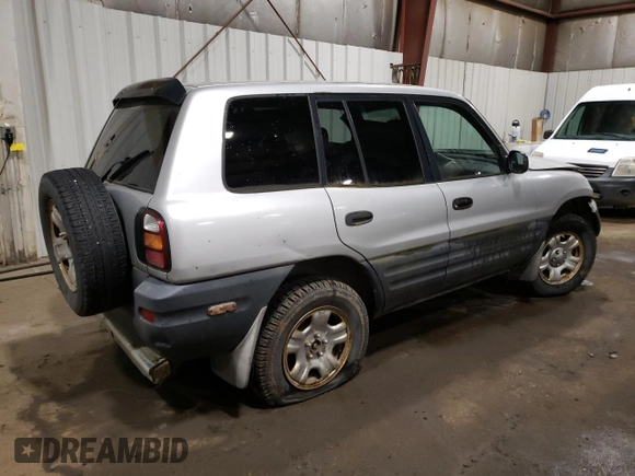 1998 Toyota RAV4 with VIN JT3HP10VXW7075633, listed as a Copart auction lot 52632125 with 185,392 mi miles and Non repairable. Bid and sale history available at DreamBid. Image 3.