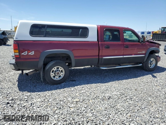 2004 GMC Sierra 2500HD z VIN 1GTHK23154F118397, wystawiony jako Copart lot #57627955 z przebiegiem 208 949 mil mil oraz Szkoda całkowita • Salvage title. Historia ofert i sprzedaży dostępna na DreamBid. Obrazek 3.