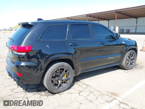 2020 Jeep Grand Cherokee Trackhawk with VIN 1C4RJFN96LC336561, listed as a IAAI auction lot 41991800 with 58,781 mi miles and . Bid and sale history available at DreamBid. Image 4.