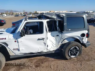 2019 Jeep Wrangler Unlimited Rubicon with VIN 1C4HJXFN7KW505383, listed as a IAAI auction lot 41220907 with 53,578 mi miles and . Bid and sale history available at DreamBid. Image 6.