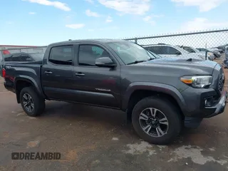 2018 Toyota Tacoma SR5 with VIN 3TMAZ5CN0JM061233, listed as a IAAI auction lot 41944668 with 94,314 mi miles and . Bid and sale history available at DreamBid. Image 13.