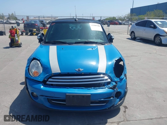 2014 MINI Convertible с VIN WMWZN3C55ET569656, выставлен на аукционе IAAI как лот 42105348 с пробегом 87 671 миль миль и . История ставок и продаж доступна на DreamBid. Изображение 12.