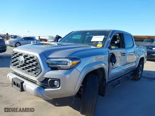 2020 Toyota Tacoma 2WD SR5 with VIN 3TMAZ5CN2LM120124, listed as a IAAI auction lot 41720985 with 79,801 mi miles. Bid and sale history available at carsss.com. Image 2.