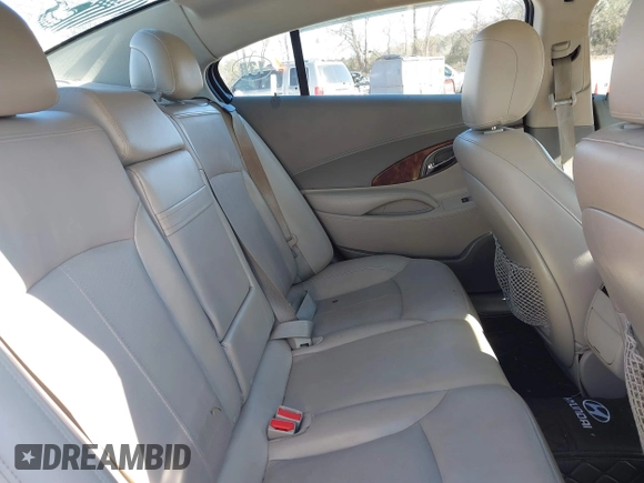 2013 Buick LaCrosse Touring z VIN 1G4GJ5E30DF289424, wystawiony jako IAAI lot #41248367 z przebiegiem 119 732 mil mil oraz . Historia ofert i sprzedaży dostępna na DreamBid. Obrazek 8.